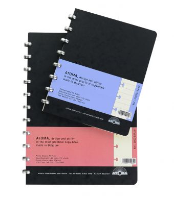 Disc-bound notebooks with black traditional card covers and aluminium discs filled with cream paper.